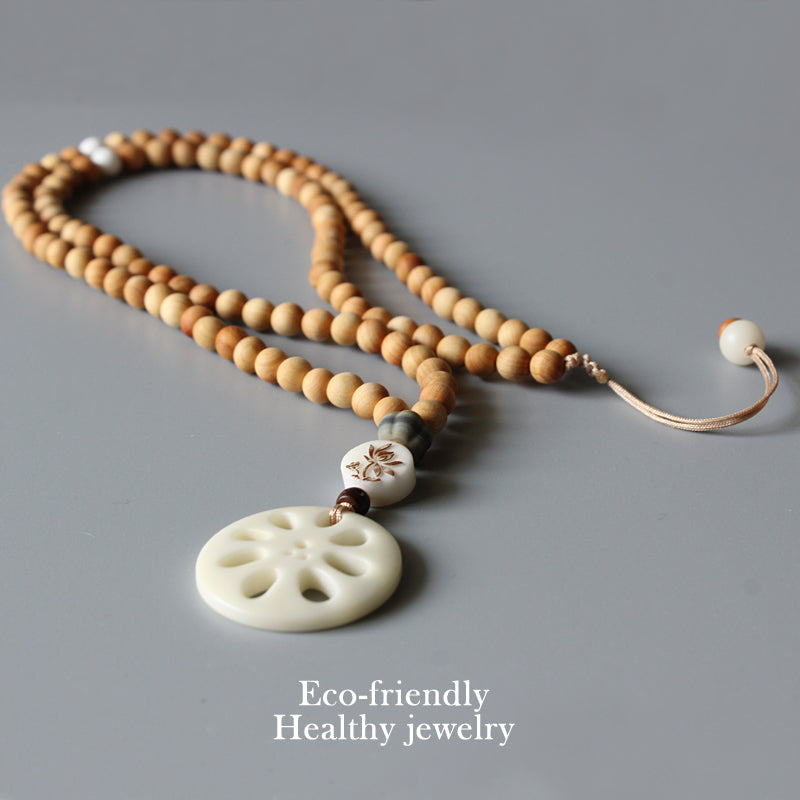 Buddhist Handcrafted Nature Sandalwood Abundance Pendant (Tagua Nut)