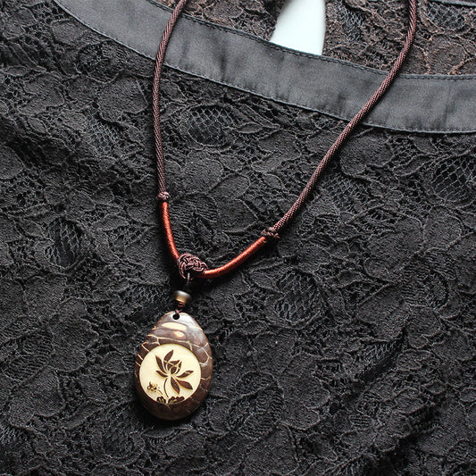 Solace Lotus Necklace (Tagua Nut)