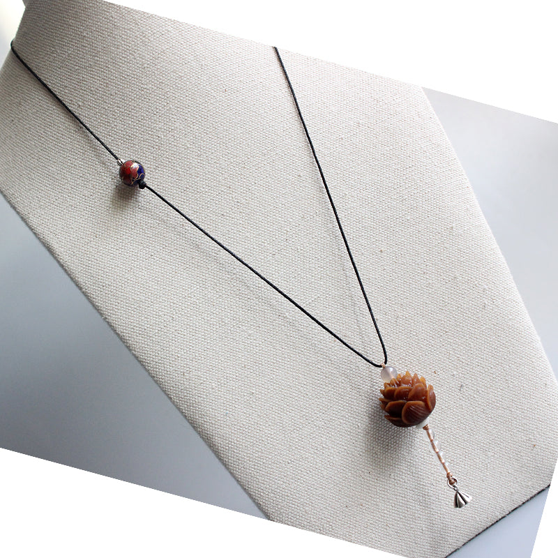 Enlightening Lotus Flower Pendant (Bodhi Seed)