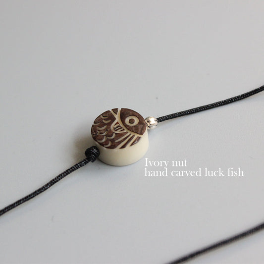 Protective Lotus Pendant (Tagua Nut)