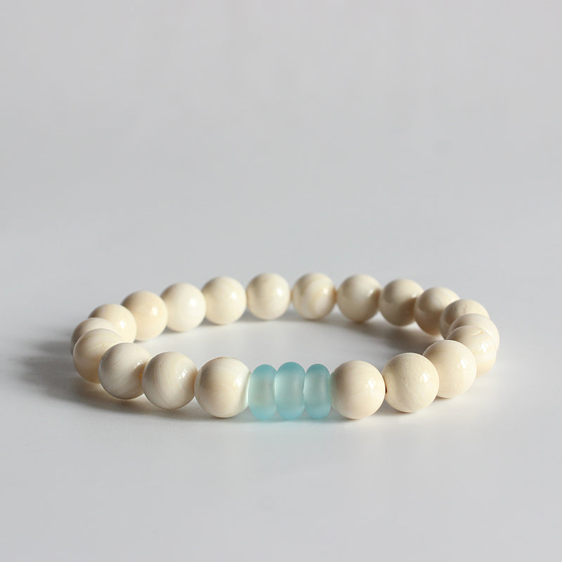 Buddhist Handcrafted Nature Sandalwood Bracelet - "Mother of Pearl" (made with White Ocean Bodhi Seeds)