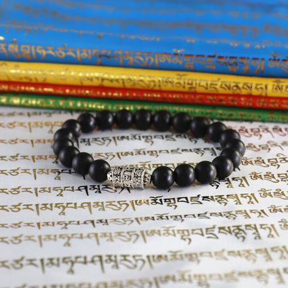 Buddhist Handcrafted Nature Sandalwood Bracelet for "Protection & Courage" - with Prayer Wheel & Healing Black Bead Onyx