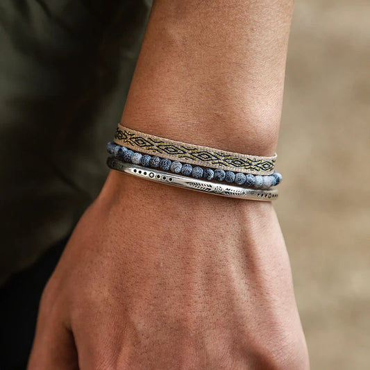 Tibetan Steel & Handcarved Spirit Bracelet for "New Beginnings" (Beads made of Natural Weathered Blue Stone)