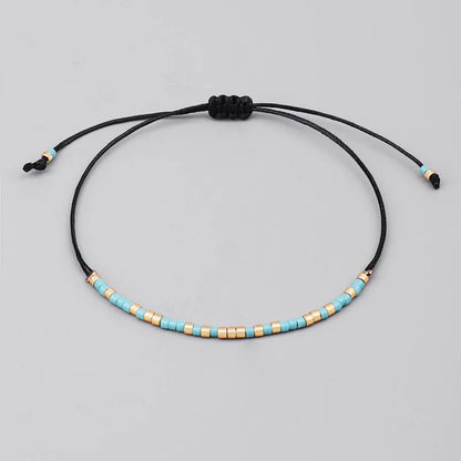 Handmade Tibetan Blessed Knots for "Courage & Confidence" with Natural Miyuki Rice Beads