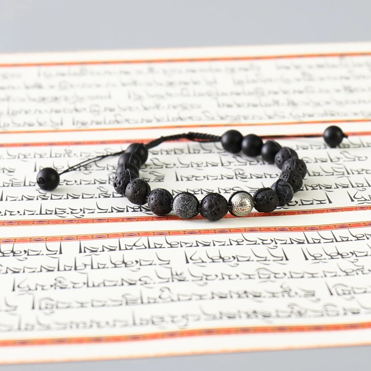 Handmade Tibetan Blessed Black Onyx for "Protection & Inner Strength"  with Om Mani Padme Hum Charm