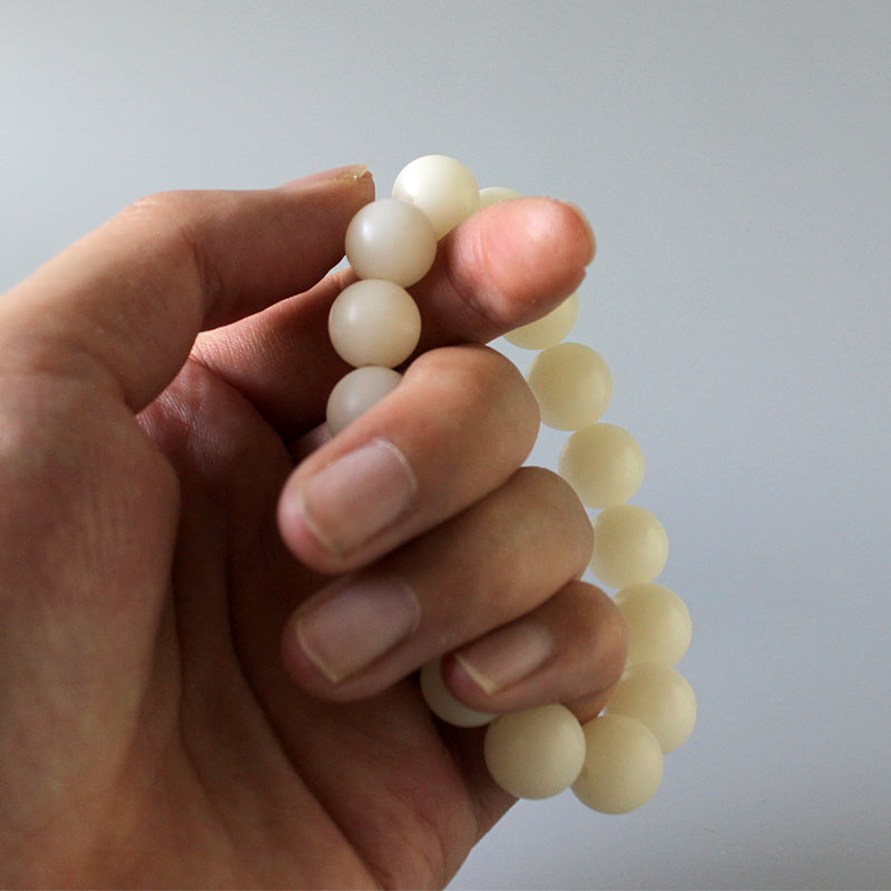 Buddhist Handcrafted Nature Sandalwood Bracelet for "Purity" (made with Organic White Ivory Seeds)