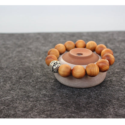 Buddhist Handcrafted Nature Sandalwood Bracelet for "Power & Adventure" (with Traditional Dragon Amulet)