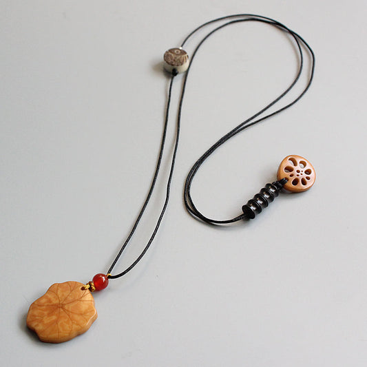 Protective Lotus Pendant (Tagua Nut)