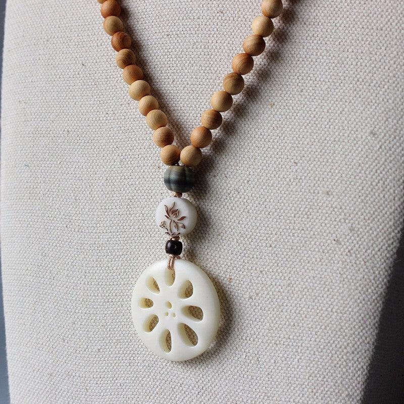 Buddhist Handcrafted Nature Sandalwood Abundance Pendant (Tagua Nut)