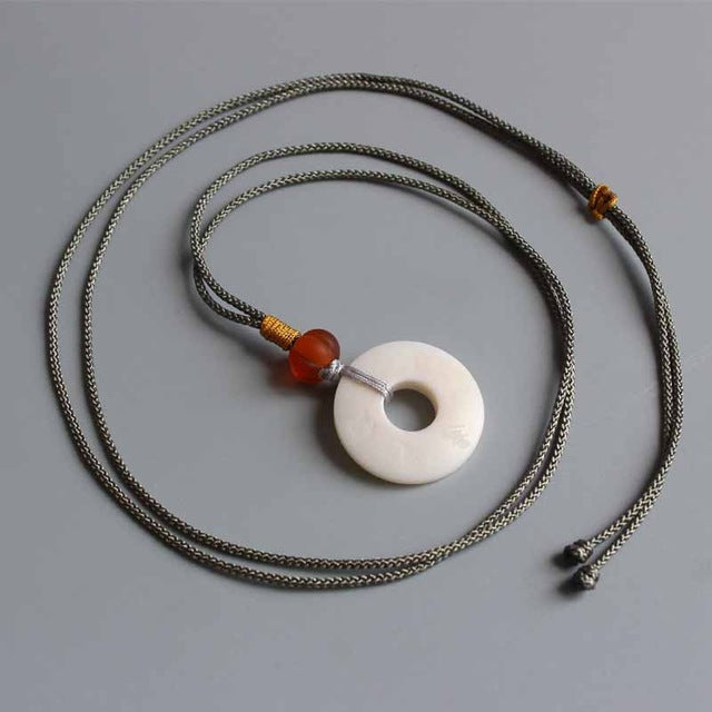 Strength and Transformation Necklace (Tagua Nut)