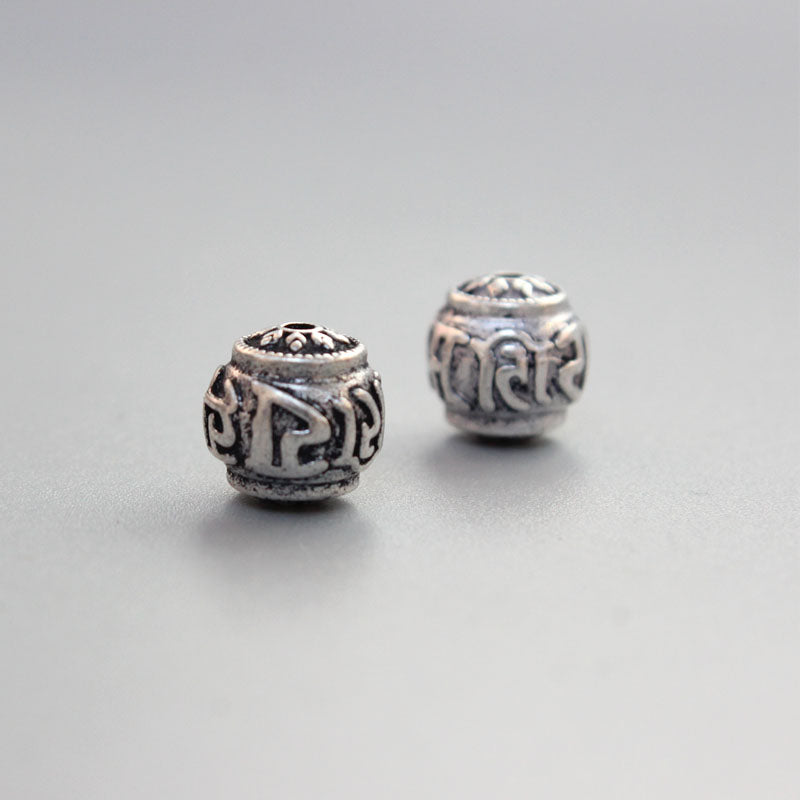 Tibetan Character Pendant (White Copper)
